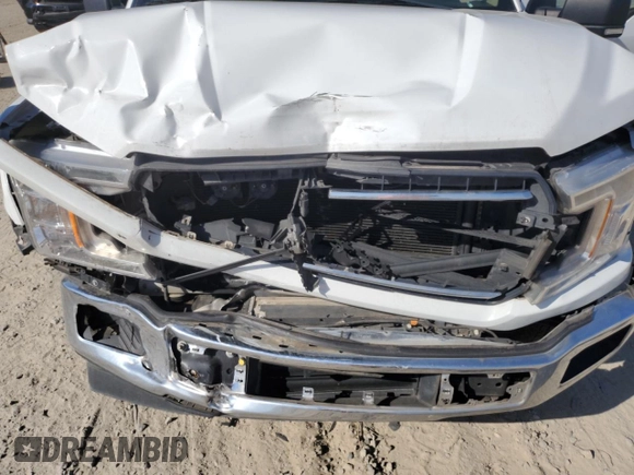 2018 Ford F-150 XL с VIN 1FTEW1CG9JFE23662, выставлен на аукционе Copart как лот 49213735 с пробегом 141 824 миль миль и Чистый • Clean title. История ставок и продаж доступна на DreamBid. Изображение 11.