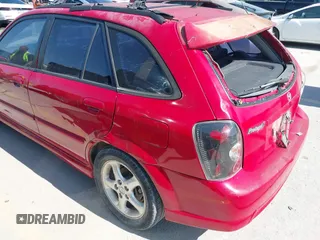 2002 Mazda Protege with VIN JM1BJ246721565634, listed as a IAAI auction lot 41984727 with 235,764 mi miles and . Bid and sale history available at DreamBid. Image 6.