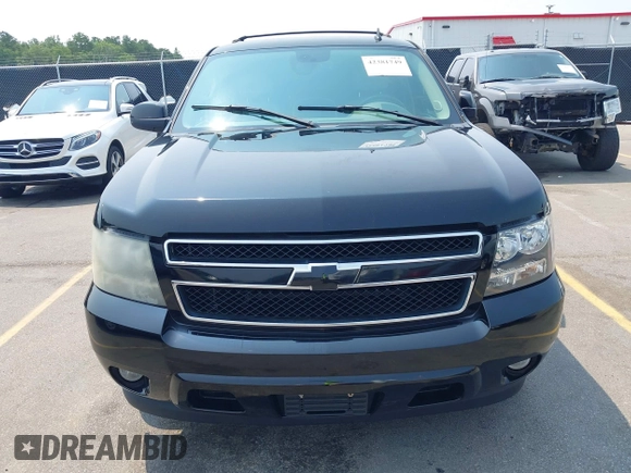 2007 Chevrolet Tahoe LTZ with VIN 1GNFC13007R111180, listed as a IAAI auction lot 42381749 with 126,472 mi miles and . Bid and sale history available at DreamBid. Image 12.