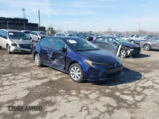 2023 Toyota Corolla Hybrid LE with VIN JTDBCMFE7PJ005985, listed as a IAAI auction lot 41574856 with 31,568 mi miles. Bid and sale history available at carsss.com. Image 1.