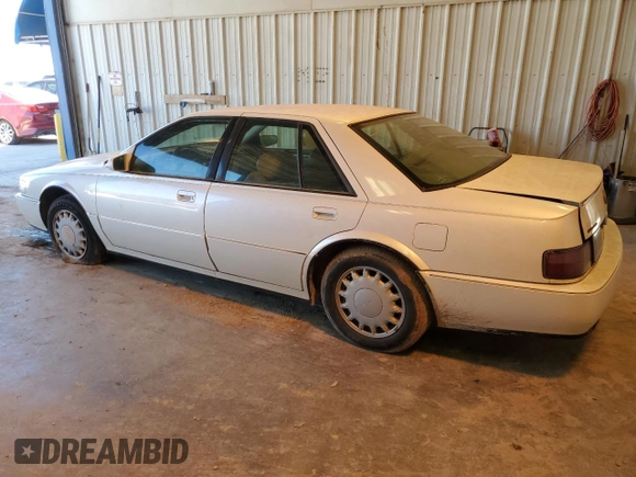 1993 Cadillac Seville Touring STS z VIN 1G6KY5295PU817593, wystawiony jako Copart lot #47807075 z przebiegiem Nie podano mil oraz Czysty tytuł • Clean title. Historia ofert i sprzedaży dostępna na DreamBid. Obrazek 2.