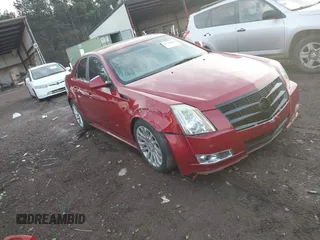 2010 Cadillac CTS Premium with VIN 1G6DS5EV7A0132321, listed as a IAAI auction lot 41290621 with 179,453 mi miles and . Bid and sale history available at DreamBid. Image 1.