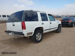 1995 Chevrolet Tahoe with VIN 1GNEK13K8SJ452589, listed as a IAAI auction lot 41788147 with 291,313 mi miles. Bid and sale history available at carsss.com. Image 4.