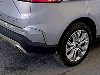 2022 Ford Edge Titanium z VIN 2FMPK4K95NBA81624, wystawiony jako IAAI lot #42428595 z przebiegiem 104 330 mil mil oraz . Historia ofert i sprzedaży dostępna na DreamBid. Obrazek 1.