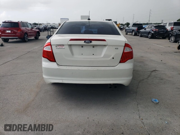 2012 Ford Fusion SE z VIN 3FAHP0HA3CR194075, wystawiony jako Copart lot #63380895 z przebiegiem 176 634 mil mil oraz Szkoda całkowita • Salvage title. Historia ofert i sprzedaży dostępna na DreamBid. Obrazek 6.