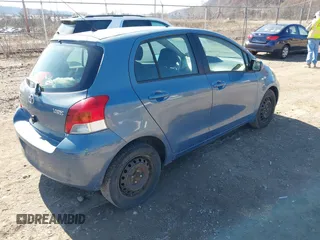 2010 Toyota Yaris with VIN JTDKT4K3XA5282294, listed as a IAAI auction lot 41856423 with 264,409 mi miles. Bid and sale history available at carsss.com. Image 4.
