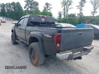 2004 GMC Canyon SLE Z71 z VIN 1GTDT196548169346, wystawiony jako IAAI lot #42482724 z przebiegiem 244 045 mil mil oraz . Historia ofert i sprzedaży dostępna na DreamBid. Obrazek 3.