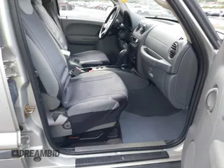 2006 Jeep Liberty Sport with VIN 1J4GL48K86W158301, listed as a IAAI auction lot 42095349 with 217,187 mi miles. Bid and sale history available at carsss.com. Image 5.