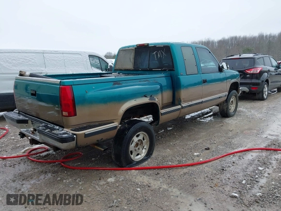 1994 GMC Sierra 1500 with VIN 2GDEK19K2R1549660, listed as a IAAI auction lot 41615642 with 207,399 mi miles and . Bid and sale history available at DreamBid. Image 4.