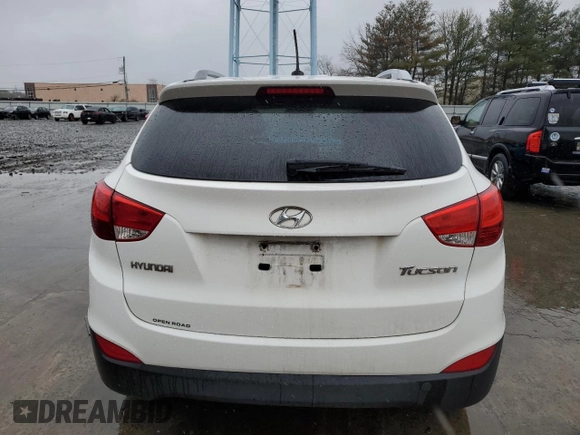 2013 Hyundai Tucson GLS with VIN KM8JU3AC0DU770079, listed as a Copart auction lot 52639835 with 212,894 mi miles and Clean Title. Bid and sale history available at carsss.com. Image 6.