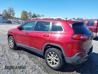 2016 Jeep Cherokee Latitude with VIN 1C4PJMCB2GW153972, listed as a IAAI auction lot 40579489 with 130,176 mi miles. Bid and sale history available at carsss.com. Image 3.