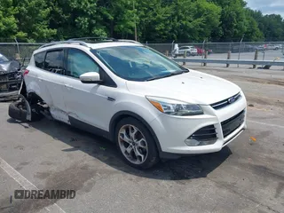 2016 Ford Escape Titanium with VIN 1FMCU9J90GUC48346, listed as a IAAI auction lot 42523307 with 114,265 mi miles and . Bid and sale history available at DreamBid. Image 1.