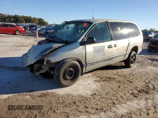 1999 Plymouth Voyager Grand SE z VIN 1P4GP44G1XB579504, wystawiony jako Copart lot #50064475 z przebiegiem Nie podano mil oraz Nie do naprawy. Historia ofert i sprzedaży dostępna na DreamBid. Obrazek 1.