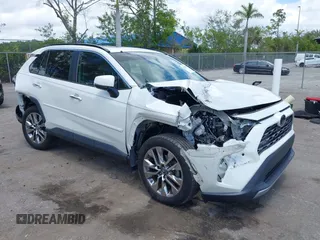 2019 Toyota RAV4 Limited z VIN 2T3Y1RFV1KW042327, wystawiony jako IAAI lot #42150251 z przebiegiem 57 240 mil mil oraz . Historia ofert i sprzedaży dostępna na DreamBid. Obrazek 1.