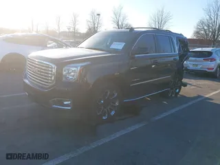 2019 GMC Yukon SLT with VIN 1GKS2BKCXKR307135, listed as a IAAI auction lot 41323052 with 84292 miles. Bid and sale history available at carsss.com. Image 17.