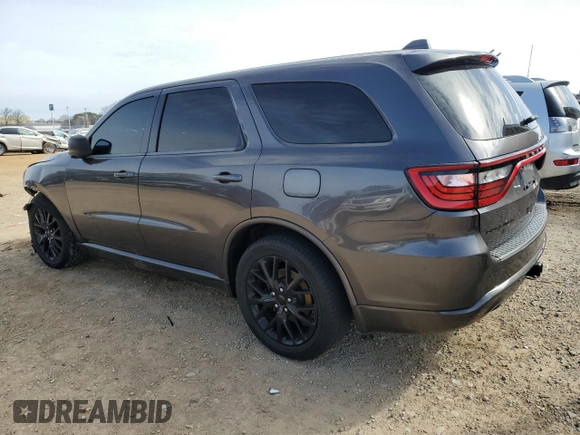 2015 Dodge Durango R/T with VIN 1C4SDHCT7FC799266, listed as a Copart auction lot 47827625 with 150,143 mi miles and Salvage Title. Bid and sale history available at DreamBid. Image 2.
