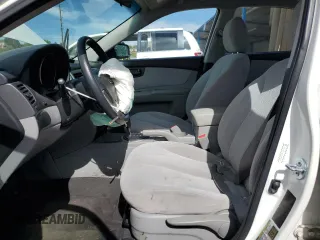 2010 Kia Optima LX z VIN KNAGG4A8XA5382979, wystawiony jako Copart lot #57067065 z przebiegiem 104 611 mil mil oraz Szkoda całkowita • Salvage title. Historia ofert i sprzedaży dostępna na DreamBid. Obrazek 7.