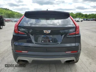 2020 Cadillac XT4 FWD Premium Luxury with VIN 1GYFZCR46LF113499, listed as a Copart auction lot 57534205 with 64,859 mi miles and Salvage title. Bid and sale history available at DreamBid. Image 6.