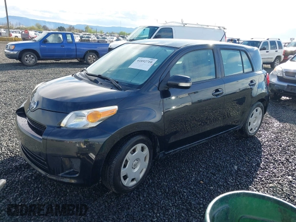 2011 Scion xD with VIN JTKKU4B43B1011178, listed as a IAAI auction lot 41892710 with Not Provided miles. Bid and sale history available at carsss.com. Image 2.