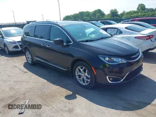 2018 Chrysler Pacifica Touring L Plus with VIN 2C4RC1EG2JR314847, listed as a IAAI auction lot 42716082 with 92,544 mi miles and . Bid and sale history available at DreamBid. Image 1.