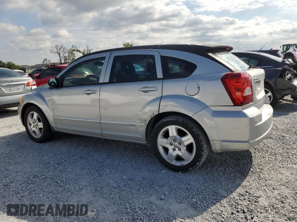 2009 Dodge Caliber SXT with VIN 1B3HB48AX9D157186, listed as a Copart auction lot 52892065 with 218,024 mi miles and Salvage Title. Bid and sale history available at carsss.com. Image 2.