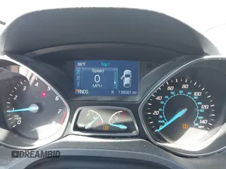 2015 Ford Escape SE with VIN 1FMCU9GX0FUB99881, listed as a IAAI auction lot 42114415 with 138,561 mi miles. Bid and sale history available at carsss.com. Image 7.