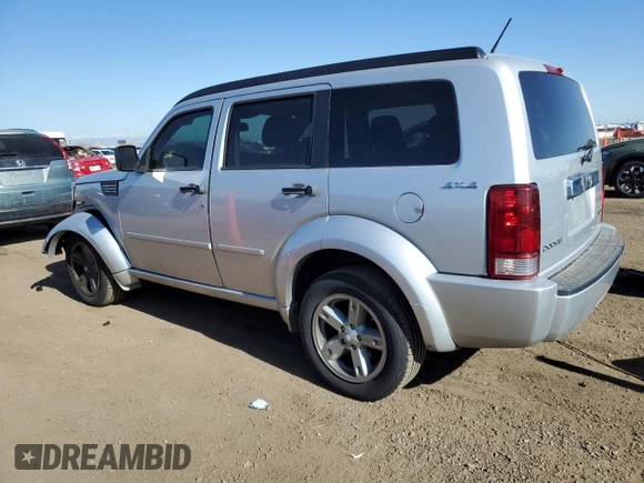 2010 Dodge Nitro SXT with VIN 1D4PU5GK1AW129356, listed as a Copart auction lot 53111155 with 158,818 mi miles and Salvage Title. Bid and sale history available at DreamBid. Image 2.
