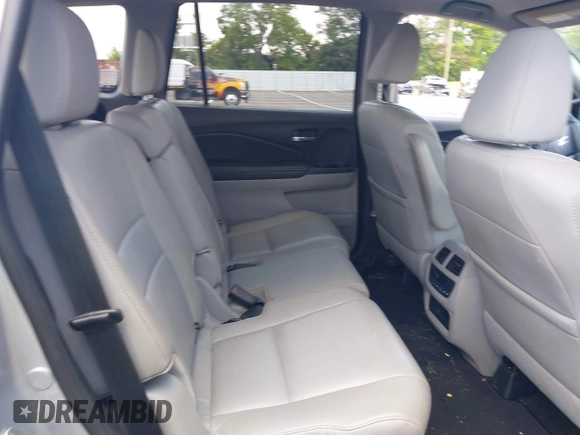 2018 Honda Pilot EX-L with VIN 5FNYF5H56JB003955, listed as a IAAI auction lot 42732433 with 116,613 mi miles and . Bid and sale history available at DreamBid. Image 8.