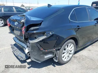 2020 Toyota Camry LE with VIN 4T1C11AKXLU955851, listed as a IAAI auction lot 41996827 with 59,008 mi miles and . Bid and sale history available at carsss.com. Image 21.