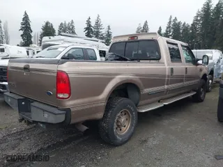 1999 Ford Super Duty F-350 SRW XL with VIN 1FTSW31F4XEC57817, listed as a IAAI auction lot 41272762 with 96,842 mi miles. Bid and sale history available at carsss.com. Image 4.