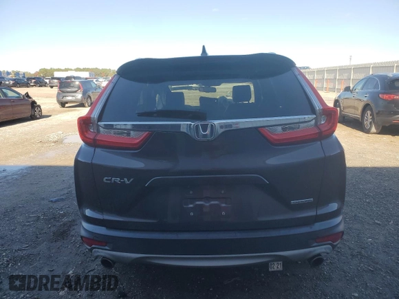 2018 Honda CR-V Touring with VIN 2HKRW1H94JH507406, listed as a Copart auction lot 86980214 with 76,527 mi miles and Salvage Title. Bid and sale history available at DreamBid. Image 6.
