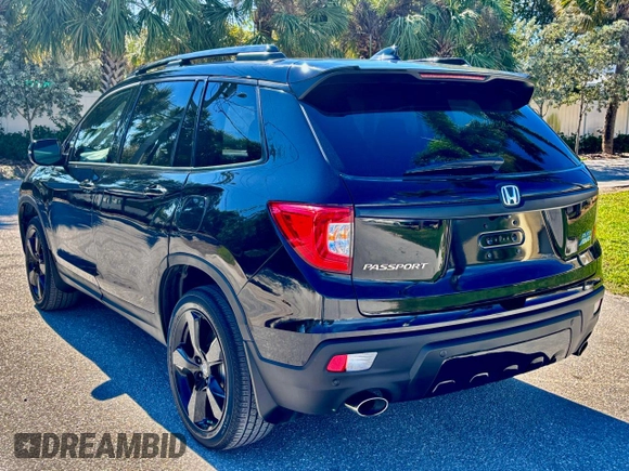 2021 Honda Passport Elite with VIN 5FNYF8H01MB013559, listed as a Copart auction lot 53684375 with 37,300 mi miles and Clean Title. Bid and sale history available at carsss.com. Image 3.