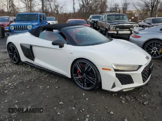 2020 Audi R8 Spyder performance z VIN WUA4BCFX3L7901606, wystawiony jako Copart lot #86108444 z przebiegiem 3 669 mil mil oraz Nie do naprawy • Non repairable. Historia ofert i sprzedaży dostępna na DreamBid. Obrazek 4.