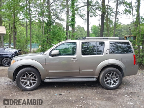 2005 Nissan Pathfinder SE z VIN 5N1AR18WX5C748572, wystawiony jako IAAI lot #42180475 z przebiegiem 291 301 mil mil oraz . Historia ofert i sprzedaży dostępna na DreamBid. Obrazek 14.