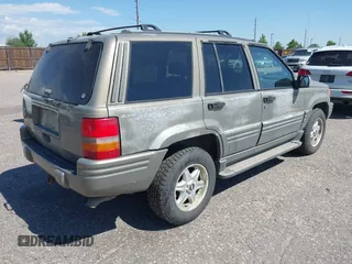 1996 Jeep Grand Cherokee Limited with VIN 1J4GZ78Y1TC162546, listed as a IAAI auction lot 42612646 with 204,098 mi miles and . Bid and sale history available at DreamBid. Image 4.
