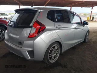 2015 Honda Fit LX with VIN 3HGGK5G52FM764205, listed as a IAAI auction lot 42641420 with 104,783 mi miles and . Bid and sale history available at DreamBid. Image 4.
