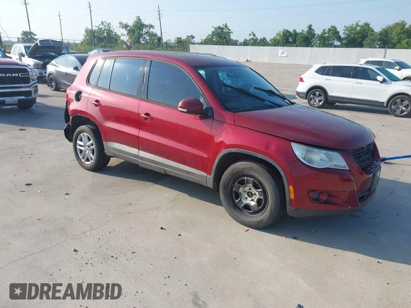 2011 Volkswagen Tiguan SEL w/Premium Navi with VIN WVGAV7AX4BW001402, listed as a IAAI auction lot 42406619 with 183,035 mi miles and . Bid and sale history available at DreamBid. Image 1.