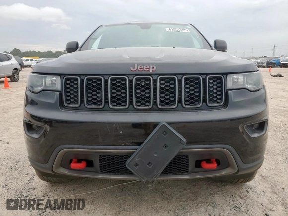 2019 Jeep Grand Cherokee Trailhawk with VIN 1C4RJFLG8KC613582, listed as a Copart auction lot 62901405 with 136,809 mi miles and Salvage title. Bid and sale history available at DreamBid. Image 5.