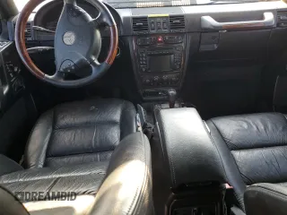 2005 Mercedes-Benz G-Class with VIN WDCYR49EX5X162368, listed as a Copart auction lot 53579154 with 151,040 mi miles and Salvage Title. Bid and sale history available at carsss.com. Image 8.