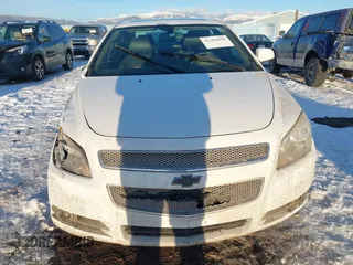 2012 Chevrolet Malibu LTZ with VIN 1G1ZG5E73CF270839, listed as a IAAI auction lot 41284490 with 133,423 mi miles and . Bid and sale history available at DreamBid. Image 12.