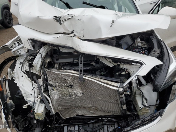 2021 Cadillac XT4 FWD Luxury z VIN 1GYAZAR48MF018135, wystawiony jako Copart lot #43023665 z przebiegiem 54 271 mil mil oraz Szkoda całkowita • Salvage title. Historia ofert i sprzedaży dostępna na DreamBid. Obrazek 14.