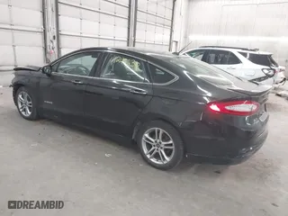 2015 Ford Fusion Titanium Hybrid with VIN 3FA6P0RU2FR309074, listed as a IAAI auction lot 41240630 with 172,025 mi miles. Bid and sale history available at carsss.com. Image 3.