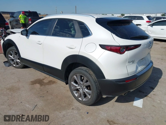 2023 Mazda CX-30 S Carbon Edition with VIN 3MVDMBCM2PM552282, listed as a IAAI auction lot 42241909 with 14,765 mi miles and . Bid and sale history available at DreamBid. Image 3.