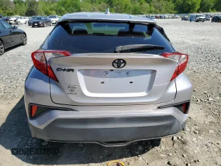 2019 Toyota C-HR XLE z VIN JTNKHMBX3K1050175, wystawiony jako Copart lot #52364415 z przebiegiem 69 811 mil mil oraz Szkody całkowita. Historia ofert i sprzedaży dostępna na DreamBid. Obrazek 6.