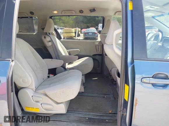 2014 Toyota Sienna LE AAS with VIN 5TDKK3DC1ES436031, listed as a IAAI auction lot 42147191 with 276,821 mi miles. Bid and sale history available at carsss.com. Image 8.
