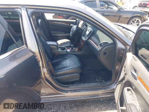 2014 Chrysler 300 with VIN 2C3CCAAG3EH237157, listed as a IAAI auction lot 41986053 with 61,372 mi miles and . Bid and sale history available at DreamBid. Image 5.