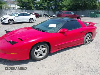 1995 Pontiac Firebird Formula z VIN 2G2FV22P8S2255664, wystawiony jako IAAI lot #42580637 z przebiegiem 148 677 mil mil oraz . Historia ofert i sprzedaży dostępna na DreamBid. Obrazek 2.