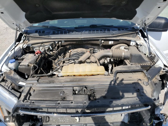 2020 Ford F-150 XL with VIN 1FTEX1C52LKF57905, listed as a Copart auction lot 52143765 with 76,855 mi miles and Salvage Title. Bid and sale history available at DreamBid. Image 11.