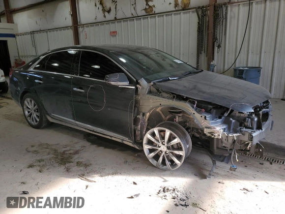 2014 Cadillac XTS with VIN 2G61L5S30E9159696, listed as a Copart auction lot 87954675 with 31,920 mi miles and Salvage Title. Bid and sale history available at carsss.com. Image 4.