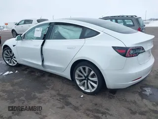 2018 Tesla Model 3 Long Range Battery with VIN 5YJ3E1EB2JF089006, listed as a IAAI auction lot 41186372 with Not Provided miles and . Bid and sale history available at DreamBid. Image 3.